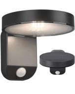 Trio Posadas wandlamp met een diameter van 15 cm voor buiten met een schijfvormige kap met zonnepaneel erop en geintegreerde led