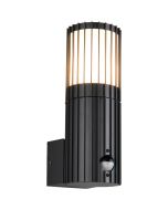 Trio Volga antraciet grijze wandlamp voor buiten met bewegingsmelder van 23,5cm hoog met staande lantaarn met verticale lamellen langs de lamp