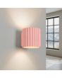 brandende roze geribbelde metalen wandlamp met een diameter van 10 cm en een G9 fitting