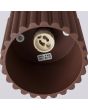 binnenzijde met GU10 fitting van de bruin geribbelde metalen plafondlamp met een diameter van 10 cm