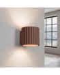 brandende bruin geribbelde metalen wandlamp met een diameter van 10 cm en een G9 fitting