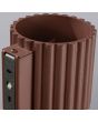 bevestiging van de bruin geribbelde metalen wandlamp met een diameter van 10 cm en een G9 fitting