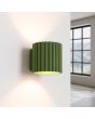 Brandende Sollux Aura olijf groen geribbeld cilindervormige wandlamp van 10 cm in hoogte met een G9 lampje erin