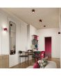Sfeerfoto van twee Sollux Aura burgundy geribbeld cilindervormige plafondlampen van 10 cm in diameter met een GU10 lampje erin in een woonkamer met diverse andere lampen uit dezelfde serie