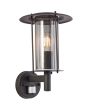 Brilliant Detroit 96463/76 brandende zwarte wandlamp voor buiten met bewegingsmelder en met staande lantaarn en dubbele cilindervormige kap van zwart gaas en helder kunststof