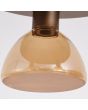 Detailfoto van een kapje van de Searchlight Cannes plafondlamp van 42cm in diameter met koffiebruine plafondplaat en drie amber glazen schaalvormige kapjes