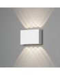Konstsmide Chieri witte wandlamp van 17 cm breed voor buiten met meerdere lichtpunten met een bijzonder lichteffect op de muur