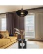 Trio Colino 315900132 sfeerfoto van zwarte hanglamp van zwart houten lamellen in een woonkamer met gele bank en paarse gordijnen