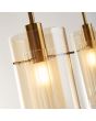 Searchlight Duo 3303-3CP detailfoto van het glas met de ophanging daarvan van de messing plafondlamp met ronde plafondplaat en stang met drie pendels met elk een dubbel glazen kap van met en champagnekleurig glas