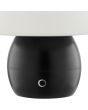 Detailfoto van de touchdimmer van de Brilliant Dupos zwarte kunststof oplaadbare tafellamp met wit glazen ovale kap met een hoogte van 22,2 cm en een diameter van 22 cm