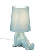 Brandende Reality Huma blauwe tafellamp van 24,5 cm hoog met lampvoet in de vorm van een zittend lichaam en een kapje van textiel als hoofd