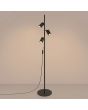 brandende zwart metalen vloerlamp met drie geribbelde spotjes met een diameter van 65 mm aan een stang van 155 cm hoog
