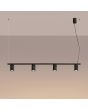 brandende zwarte langwerpige hanglamp Karbon van 122 cm lang met vier geribbelde spots van 65mm in diameter