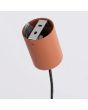 plafondkapje van de okerrood langwerpige hanglamp Karbon van 122 cm lang met vier geribbelde spots van 65mm in diameter