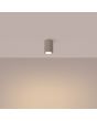 Brandende Sollux Karbon taupe kleurige plafondlamp van 10 cm hoog en 6,5 cm in diameter met geribbelde zijkant en GU10 lampje naar beneden gericht