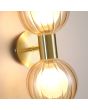 Searchlight Luminsphere 30507GO detailfoto bevestiging van de goudkleurige wandlamp voor de badkamer met twee champagne kleurig bolvormig geribbeld glazen kapjes