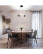Searchlight Moonbeam 10868-1BK sfeerfoto van marmerkleurige ringvormige hanglamp met ronde zwarte plafondplaat, hangend aan vier staalkabels boven een brede eettafel met vier grijs metalen stoelen voor een keukenentree