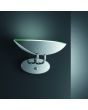 Trio Nautico 227070106 sfeerfoto van chromen wandlamp met dimmer tegen een blauwe wand
