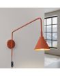 Brandende Sollux Nox oker rode wandlamp met een uitval van 61 cm met een kantelbare spot met E14 fitting en snoer van 185 cm met schakelaar en stekker