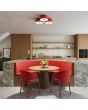 sfeerfoto van drie rood metalen plafonnières van 30 cm in diameter met wit kunststof blender boven een eettafel
