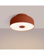Brandende Sollux Omiq oker rode plafonnière met een diameter van 30 cm en een hoogte van 15 cm van metaal met een kunststof blender