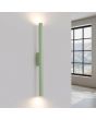brandende saliegroene buisvormige up en down wandlamp van 25 mm in diameter en 50 cm in hoogte