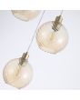 Searchlight Radiance 44520-3CP detailfoto van de glazen kappen van de hanglamp met goudkleurige ronde plafondplaat en drie goudkleurige pendels met gedraaid geribbelde champagnekleurig glazen kap