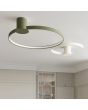 Sfeerfoto van twee plafonnieres uit de Rio plafonniere serie in beige en groen met geïntegreerde LED aan de binnenzijde van de ring