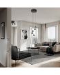 Trio Romeo 337030532 sfeerfoto in een modern huiskamer van zwarte ronde hanglamp met vijf kegelvormige kappen met LED rand in de kegel en liftfunctie in de plafondbalk. Met schakelaar voor het instellen van de lichtkleur.