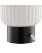 Detailfoto van de USB laadpoort van de Brilliant Sarastro zwarte kunststof oplaadbare tafellamp voor buiten met wit ribbelglazen ovale kap met een hoogte van 14 cm en een diameter van 12,5 cm
