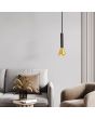 Searchlight Signal 13611-1BGO sfeerfoto van hanglamp met zwart plafondplaatje en een zwart buisvormige kap met een goudkleurig kegelvormig uiteinde in een woonkamer met grijze bank en een taupe kleurige stoel