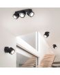 Trio Taurus 652910332 sfeerfoto van mat zwart in te bouwen spot met drie spotjes met LED paneeltjes waarvan de kern en de rand apart schakelbaar zijn met drie enkele spots als wand en plafondspot