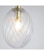 Searchlight Whirl 24141CL detailfoto van de kap van de mat messing hanglamp met gedraaid helder glazen kap