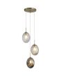 Searchlight Whirl 24141-3SB brandende hanglamp met ronde mat messing plafondplaat en drie pendels met ovaal gedraaid glazen kappen in helder, amber en rookglas