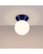 Brandende Sollux Zori blauwe badkamerlamp voor wand of plafondmontage met een wit glazen bol van 12 cm in diameter